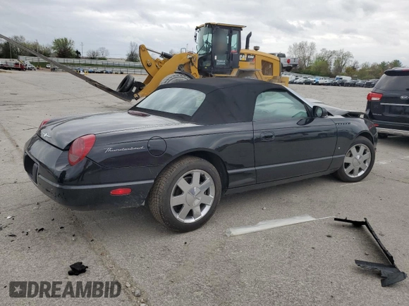 2003 Ford Thunderbird Deluxe z VIN 1FAHP60AX3Y101570, wystawiony jako Copart lot #51546865 z przebiegiem 108 736 mil mil oraz Szkoda całkowita • Salvage title. Historia ofert i sprzedaży dostępna na DreamBid. Obrazek 3.