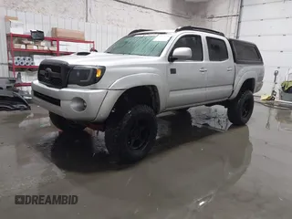 2011 Toyota Tacoma with VIN 3TMLU4EN9BM070836, listed as a IAAI auction lot 41668595 with 89,879 mi miles and . Bid and sale history available at DreamBid. Image 18.