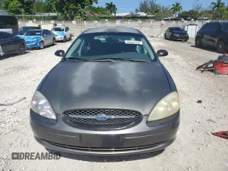 2003 Ford Taurus z VIN 1FAFP52243A153793, wystawiony jako Copart lot #55254105 z przebiegiem 89 668 mil mil oraz Szkody całkowita. Historia ofert i sprzedaży dostępna na DreamBid. Obrazek 5.