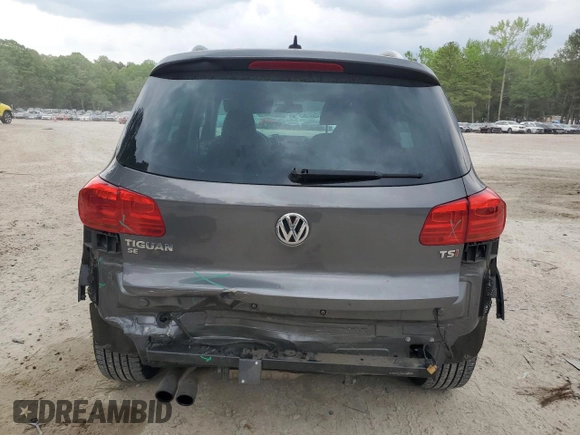 2016 Volkswagen Tiguan SEL with VIN WVGAV7AX8GW577338, listed as a Copart auction lot 53916725 with 102,111 mi miles and Salvage Title. Bid and sale history available at DreamBid. Image 6.
