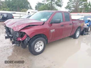 2021 Ram 1500 Tradesman with VIN 1C6RR6FG2MS512896, listed as a IAAI auction lot 40779033 with 62,030 mi miles and . Bid and sale history available at DreamBid. Image 2.