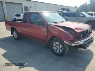 2000 Nissan Frontier XE with VIN 1N6DD26SXYC393054, listed as a Copart auction lot 62410125 with 106,319 mi miles and Salvage title. Bid and sale history available at DreamBid. Image 4.