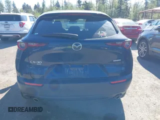 2020 Mazda CX-30 Select with VIN 3MVDMBCL4LM140110, listed as a IAAI auction lot 42194090 with 33,965 mi miles and . Bid and sale history available at DreamBid. Image 17.