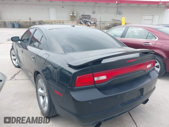 2014 Dodge Charger RT z VIN 2C3CDXCT2EH123810, wystawiony jako IAAI lot #42284705 z przebiegiem 171 159 mil mil oraz . Historia ofert i sprzedaży dostępna na DreamBid. Obrazek 3.