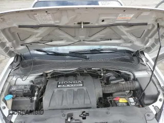 2005 Honda Pilot LX z VIN 2HKYF18195H511883, wystawiony jako Copart lot #53754595 z przebiegiem 269 419 mil mil oraz Szkoda całkowita • Salvage title. Historia ofert i sprzedaży dostępna na DreamBid. Obrazek 12.