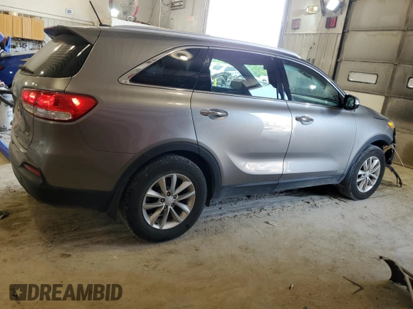 2017 Kia Sorento LX z VIN 5XYPGDA33HG293392, wystawiony jako Copart lot #62642604 z przebiegiem 73 242 mil mil oraz Szkoda całkowita • Salvage title. Historia ofert i sprzedaży dostępna na DreamBid. Obrazek 3.