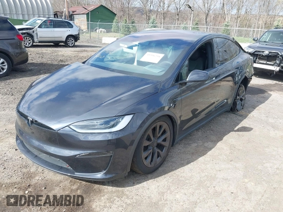 2023 Tesla Model X with VIN 7SAXCDE52PF425834, listed as a IAAI auction lot 41996298 with Not Provided miles and . Bid and sale history available at DreamBid. Image 2.