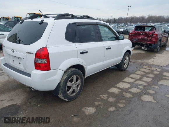 2006 Hyundai Tucson GL with VIN KM8JM12BX6U467288, listed as a IAAI auction lot 41679827 with 146,973 mi miles. Bid and sale history available at carsss.com. Image 4.