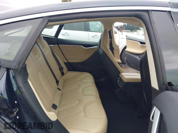2014 Tesla Model S 60 with VIN 5YJSA1H10EFP30234, listed as a IAAI auction lot 42182249 with 186,654 mi miles and . Bid and sale history available at DreamBid. Image 8.