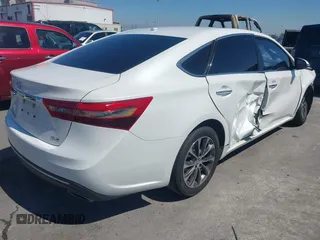 2016 Toyota Avalon Limited with VIN 4T1BK1EB4GU216774, listed as a IAAI auction lot 41861690 with 113,153 mi miles and . Bid and sale history available at carsss.com. Image 4.