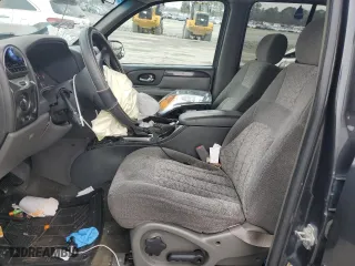 2004 GMC Envoy SLE with VIN 1GKDS13S942432115, listed as a Copart auction lot 43817125 with 147,228 mi miles and Salvage Title. Bid and sale history available at carsss.com. Image 7.