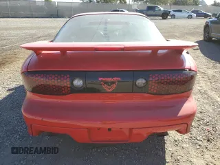 2001 Pontiac Firebird Formula z VIN 2G2FV22G112117625, wystawiony jako Copart lot #81836394 z przebiegiem 142 503 mil mil oraz Szkoda całkowita • Salvage title. Historia ofert i sprzedaży dostępna na DreamBid. Obrazek 6.