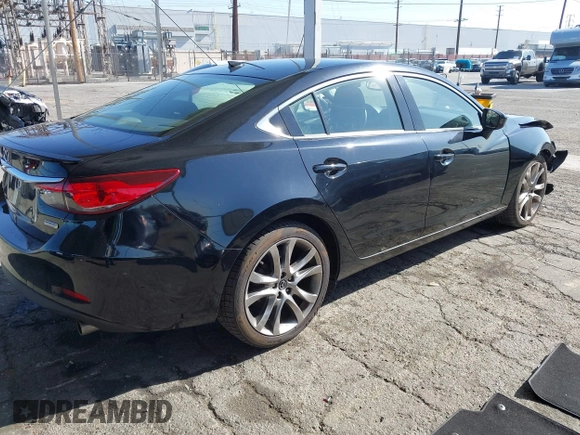 2015 Mazda 6 i Grand Touring with VIN JM1GJ1W61F1165006, listed as a IAAI auction lot 41988778 with 113,226 mi miles and . Bid and sale history available at carsss.com. Image 4.