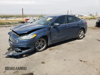 2018 Ford Fusion SE z VIN 3FA6P0LU1JR232876, wystawiony jako Copart lot #52911185 z przebiegiem 116 889 mil mil oraz Nie do naprawy • Non repairable. Historia ofert i sprzedaży dostępna na DreamBid. Obrazek 1.