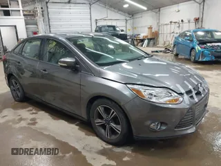 2014 Ford Focus SE with VIN 1FADP3F24EL310431, listed as a IAAI auction lot 41997295 with 108,718 mi miles. Bid and sale history available at carsss.com. Image 1.