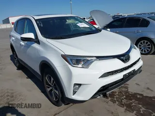 2018 Toyota RAV4 XLE z VIN 2T3WFREV3JW483398, wystawiony jako IAAI lot #41740776 z przebiegiem 70 640 mil mil oraz . Historia ofert i sprzedaży dostępna na DreamBid. Obrazek 1.