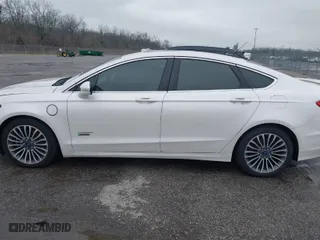 2017 Ford Fusion Energi Titanium with VIN 3FA6P0SU7HR191665, listed as a IAAI auction lot 41597438 with 166,570 mi miles. Bid and sale history available at carsss.com. Image 14.