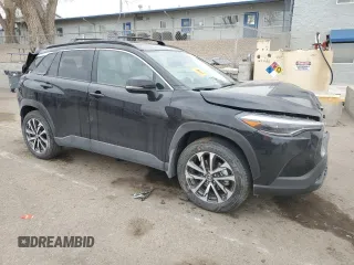 2024 Toyota Corolla Cross XLE with VIN 7MUDAABG2RV107422, listed as a Copart auction lot 47667095 with 8,579 mi miles and Salvage title. Bid and sale history available at DreamBid. Image 4.