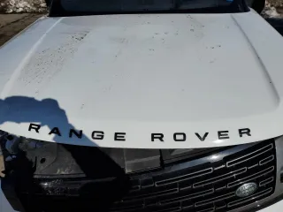 2023 Land Rover Range Rover SE z VIN SALKP9E72PA031813, wystawiony jako Copart lot #45151005 z przebiegiem Nie podano mil oraz Szkoda całkowita • Salvage title. Historia ofert i sprzedaży dostępna na DreamBid. Obrazek 12.