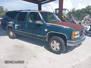1995 GMC Suburban z VIN 1GKFK16K9SJ728534, wystawiony jako IAAI lot #42358029 z przebiegiem 279 148 mil mil oraz . Historia ofert i sprzedaży dostępna na DreamBid. Obrazek 1.