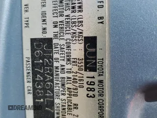 1983 Toyota Celica z VIN JT2RA64L7D6174381, wystawiony jako Copart lot #75986554 z przebiegiem 312 583 mil mil oraz Szkoda całkowita • Salvage title. Historia ofert i sprzedaży dostępna na DreamBid. Obrazek 13.