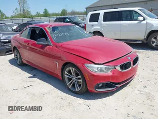 2014 BMW 4 Series 428i xDrive with VIN WBA3T1C56EPS98728, listed as a IAAI auction lot 42092079 with 102,856 mi miles and . Bid and sale history available at carsss.com. Image 1.