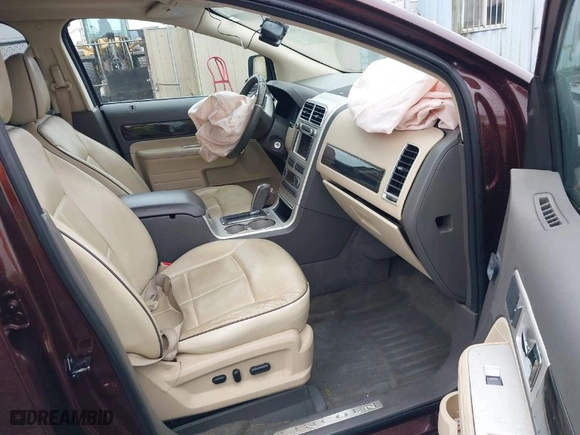 2009 Lincoln MKX with VIN 2LMDU88C89BJ03519, listed as a IAAI auction lot 41082659 with 171,216 mi miles. Bid and sale history available at carsss.com. Image 5.