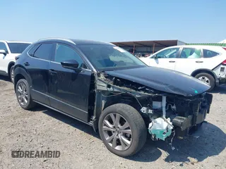 2021 Mazda CX-30 Premium with VIN 3MVDMADL7MM211889, listed as a IAAI auction lot 42156070 with 28,218 mi miles and . Bid and sale history available at DreamBid. Image 1.