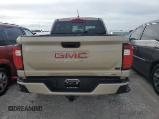 2023 GMC Canyon 4WD AT4 with VIN 1GTP6DEK3P1151112, listed as a Copart auction lot 77150454 with 5,573 mi miles and Non Repairable. Bid and sale history available at carsss.com. Image 6.