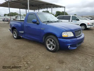 2004 Ford F-150 Heritage Lightning with VIN 2FTRF073X4CA32023, listed as a Copart auction lot 75361074 with NaN miles and Salvage Title. Bid and sale history available at carsss.com. Image 4.
