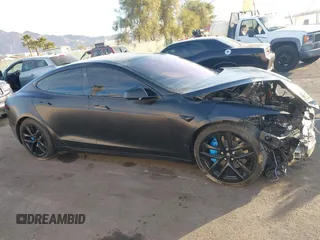 2022 Tesla Model S with VIN 5YJSA1E57NF493457, listed as a IAAI auction lot 41456284 with Not Provided miles and . Bid and sale history available at DreamBid. Image 13.