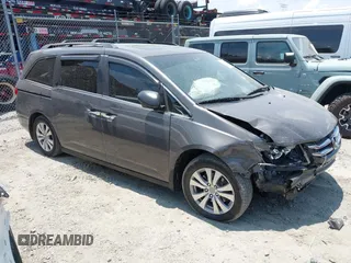 2014 Honda Odyssey EX-L with VIN 5FNRL5H6XEB089878, listed as a IAAI auction lot 42605564 with 184,061 mi miles and . Bid and sale history available at DreamBid. Image 1.