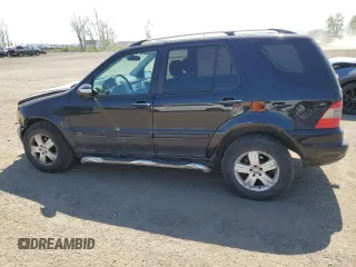 2005 Mercedes-Benz M 350 with VIN 4JGAB57E05A525053, listed as a Copart auction lot 56930405 with 189,146 mi miles and Salvage title. Bid and sale history available at DreamBid. Image 2.