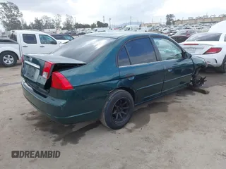 2001 Honda Civic LX with VIN JHMES16571S002955, listed as a IAAI auction lot 42128296 with 223,009 mi miles and . Bid and sale history available at DreamBid. Image 4.
