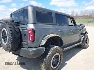 2022 Ford Bronco with VIN 1FMEE5DP3NLB03118, listed as a IAAI auction lot 42096181 with 62,685 mi miles and . Bid and sale history available at DreamBid. Image 4.