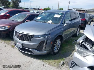 2020 Cadillac XT6 FWD Premium Luxury with VIN 1GYKPCRSXLZ105231, listed as a IAAI auction lot 41735556 with 70,319 mi miles. Bid and sale history available at carsss.com. Image 2.