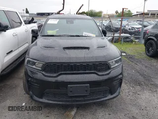 2023 Dodge Durango SRT 392 Premium with VIN 1C4SDJGJ6PC557943, listed as a IAAI auction lot 41478480 with 13,733 mi miles and . Bid and sale history available at DreamBid. Image 13.