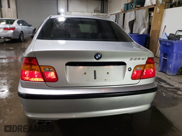 2003 BMW 3 Series 325xi with VIN WBAEU33453PM52318, listed as a Copart auction lot 52195535 with 104,018 mi miles and Salvage Title. Bid and sale history available at carsss.com. Image 6.