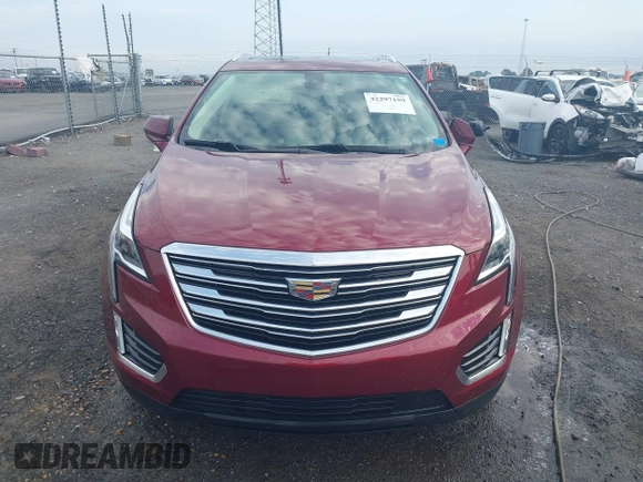 2018 Cadillac XT5 Premium Luxury FWD z VIN 1GYKNERS2JZ242842, wystawiony jako IAAI lot #42297159 z przebiegiem 72 008 mil mil oraz . Historia ofert i sprzedaży dostępna na DreamBid. Obrazek 12.