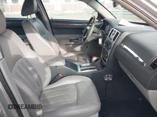 2006 Chrysler 300 C with VIN 2C3KA63H16H352507, listed as a IAAI auction lot 41926057 with 129,962 mi miles. Bid and sale history available at carsss.com. Image 5.