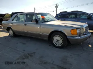 1990 Mercedes-Benz 420 with VIN WDBCA35E3LA500747, listed as a Copart auction lot 74351004 with 132,480 mi miles and Clean Title. Bid and sale history available at carsss.com. Image 4.