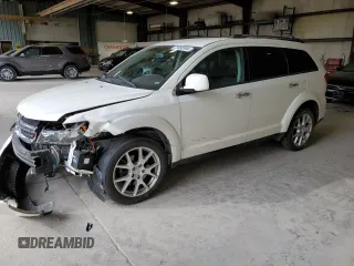 2013 Dodge Journey R/T с VIN 3C4PDDFG7DT627110, выставлен на аукционе Copart как лот 73490394 с пробегом 297 833 миль миль и Списание • Salvage title. История ставок и продаж доступна на DreamBid. Изображение 1.