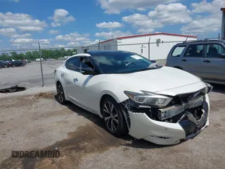 2016 Nissan Maxima Platinum with VIN 1N4AA6AP3GC413206, listed as a IAAI auction lot 42216741 with 124,190 mi miles and . Bid and sale history available at DreamBid. Image 1.