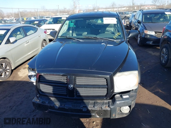 2006 Dodge Dakota SLT z VIN 1D7HW48K66S632826, wystawiony jako IAAI lot #41635407 z przebiegiem 208 046 mil mil oraz . Historia ofert i sprzedaży dostępna na DreamBid. Obrazek 13.