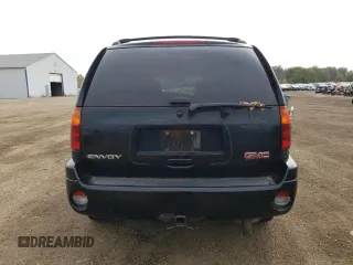2007 GMC Envoy SLT with VIN 1GKDT13S972197393, listed as a Copart auction lot 77958764 with 151,586 mi miles and Salvage Title. Bid and sale history available at DreamBid. Image 6.