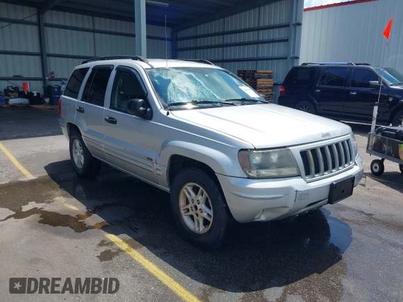 2004 Jeep Grand Cherokee Laredo with VIN 1J4GX48S34C258227, listed as a IAAI auction lot 42616107 with 160,424 mi miles and . Bid and sale history available at DreamBid. Image 1.