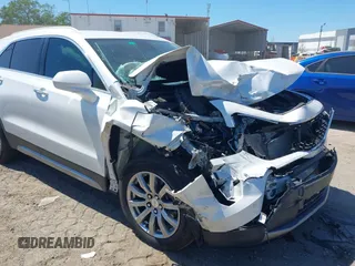 2020 Cadillac XT4 FWD Premium Luxury with VIN 1GYFZCR49LF138493, listed as a IAAI auction lot 41894823 with 49,000 mi miles and . Bid and sale history available at carsss.com. Image 6.