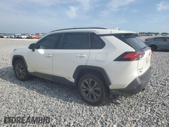 2022 Toyota RAV4 Hybrid XLE Premium with VIN JTMB6RFV4ND535282, listed as a Copart auction lot 61249445 with 82,398 mi miles and Salvage title. Bid and sale history available at DreamBid. Image 2.