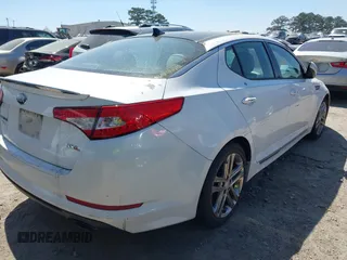2013 Kia Optima SX with VIN 5XXGR4A66DG202571, listed as a IAAI auction lot 41917407 with 167,968 mi miles. Bid and sale history available at carsss.com. Image 4.