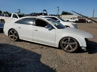 2014 Audi S8 with VIN WAUD2AFD6EN004797, listed as a Copart auction lot 69993344 with 124,196 mi miles and Salvage Title. Bid and sale history available at carsss.com. Image 4.
